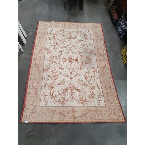 50 - A Laura Ashley Carpet on beige ground with leafage border the centre with leafage and floral designs... 