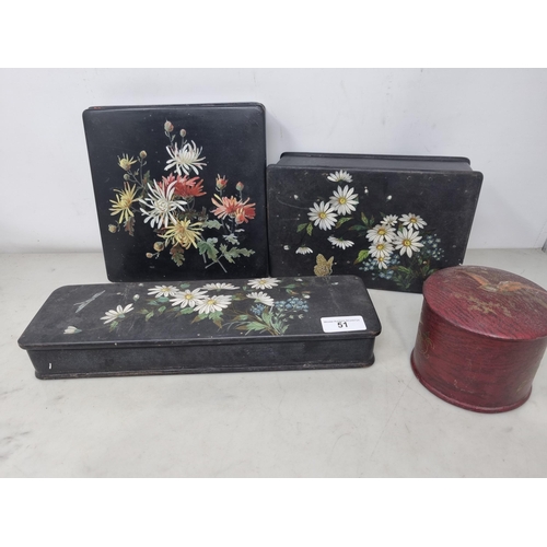 51 - Three papier mache Boxes floral painted on a black ground, and a red ground cylindrical Box decorate... 