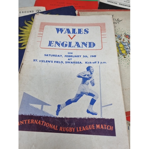 54 - A Collection of 1940's and 50's mainly Welsh Rugby Programmes including internationals, and a Collec... 