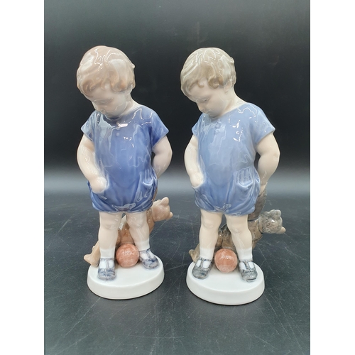 68 - Two Royal Copenhagen Figures of young boys with bears and balls on circular bases, 7in, No 3468 (R1)