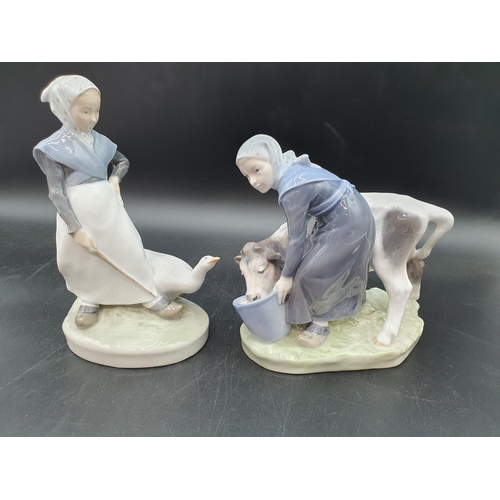 71 - A Royal Copenhagen Figure of girl and calf, No 779, and another of girl with goose, No 528 (R1)