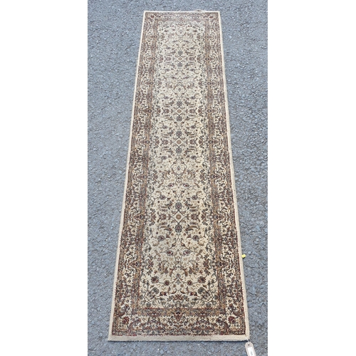 765 - A Beige bordered Runner with floral and leafage design 7ft 7