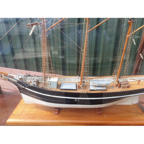 83 - A Scale Model of three masted Sailing Vessel Cumberland Lassie, Maryport, in mahogany framed and gla... 