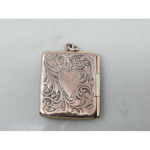 105 - A 9ct gold Envelope Stamp Case with floral and scroll engraving, heart shape cartouche, Chester 1903... 