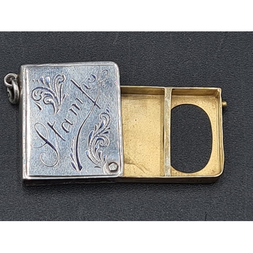 106 - A George V silver and blue enamel Pendant Stamp Case in the form of a book, Birmingham 1916