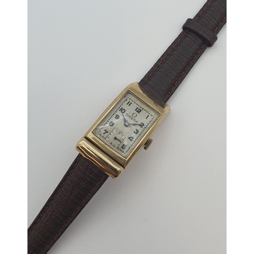 131 - A lady's Art Deco Omega Tank Wristwatch the rectangular cream dial with arabic numerals and subsidia... 