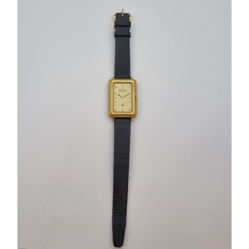 136 - A gentleman's Bulova Accutron Wristwatch the champagne rectangular dial with hourly baton markers in... 