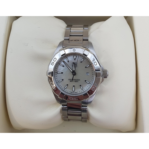 144 - A lady's Tag Heuer Aquaracer quartz Wristwatch the mother of pearl dial with hourly baton markers, s... 