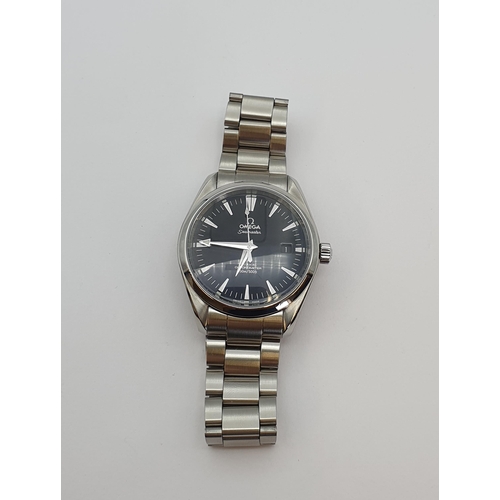 145 - A gentleman's Omega Seamaster Aqua Terra Co-Axial Wristwatch the black dial with hourly chevron mark... 