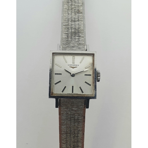 152 - A lady's Longines Wristwatch the square dial with hourly baton markers in steel case, case width app... 