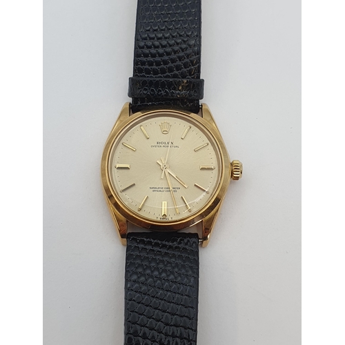 153 - A Gentleman's 1970's Rolex Oyster Perpetual Wristwatch the  brushed gold dial with hourly baton mark... 