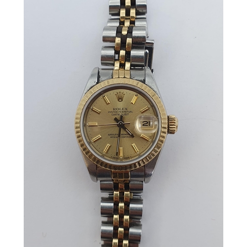 154 - A lady's 1980's Rolex Oyster Perpetual Datejust Wristwatch the brushed gold dial with hourly baton m... 