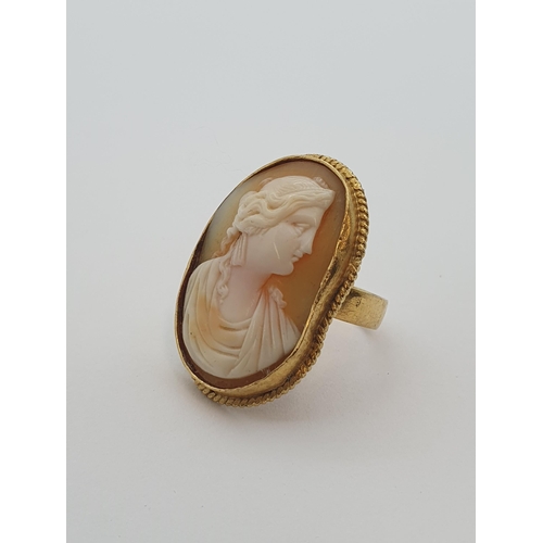 166 - A carved shell Cameo Ring of bust in profile in rope twist frame, unmarked, untested, ring size T, a... 