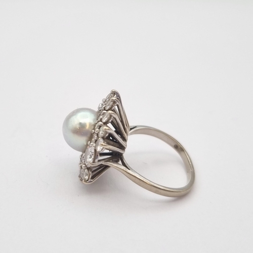 171 - A Cultured Pearl and Diamond Cluster Ring set central pearl within starburst frame claw-set brillian... 