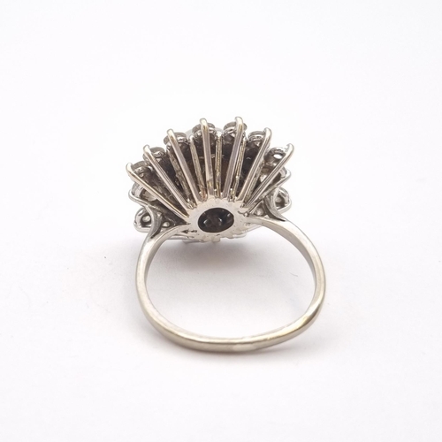 171 - A Cultured Pearl and Diamond Cluster Ring set central pearl within starburst frame claw-set brillian... 