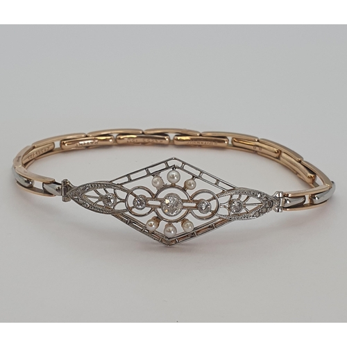 182 - An Edwardian Diamond and Seed Pearl Bracelet the front with lozenge shaped openwork plaque millegrai... 