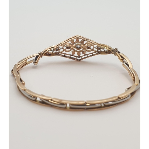 182 - An Edwardian Diamond and Seed Pearl Bracelet the front with lozenge shaped openwork plaque millegrai... 