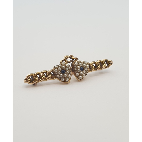 193 - A Victorian Sapphire and Seed Pearl twin heart Brooch, approx 43mm long, approx 4.40gms, unmarked, u... 