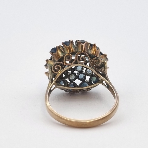 196 - A Thai Princess Ring claw-set numerous round sapphires, stamped 14K, ring size N 1/2, approx 4.30gms