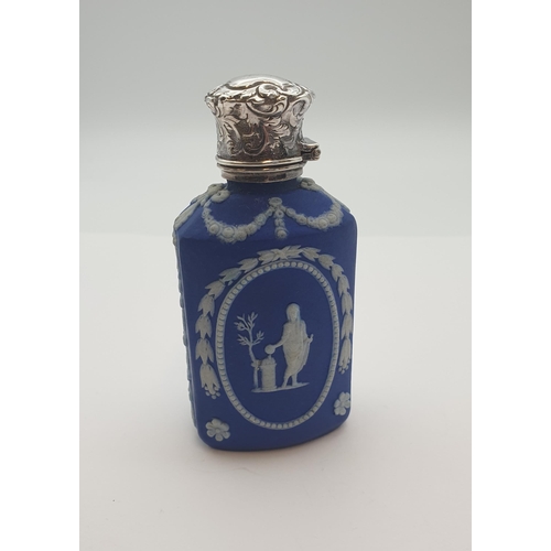 209 - A Victorian Wedgwood jasperware Scent Bottle with white metal mounts, 8cms high