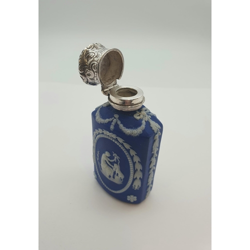 209 - A Victorian Wedgwood jasperware Scent Bottle with white metal mounts, 8cms high