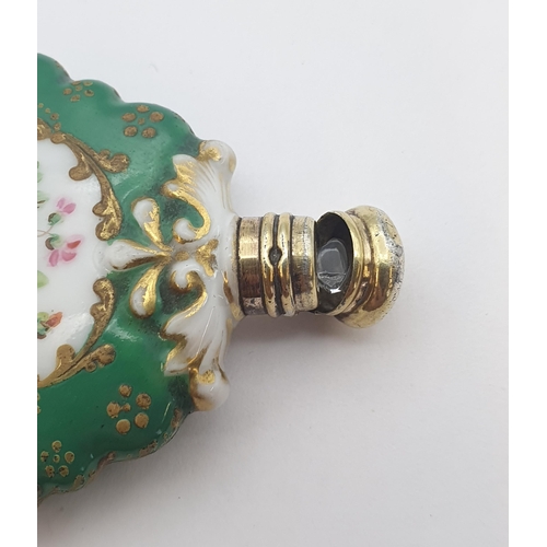 212 - A French porcelain Scent Bottle painted bouquets with silver gilt mounts, approx 5.5cms