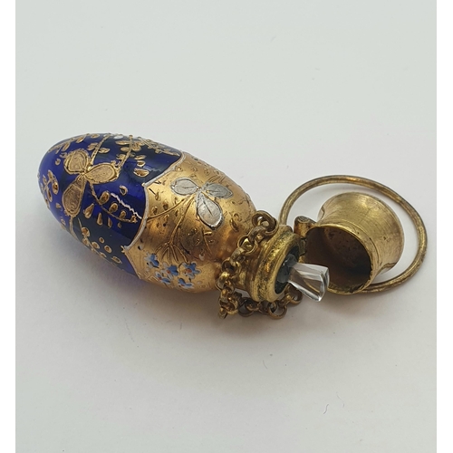 213 - A Bohemian blue glass Scent Bottle with gilt and enamel decoration, approx 5cms