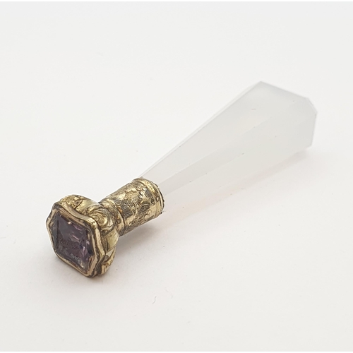 216 - A Chalcedony Seal with gilt metal mount set foil backed stone, approx 5cms long