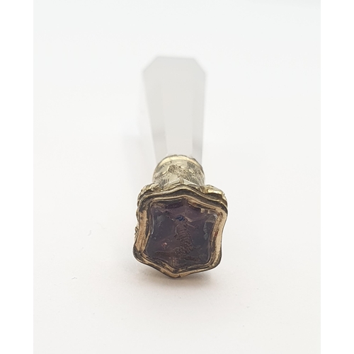 216 - A Chalcedony Seal with gilt metal mount set foil backed stone, approx 5cms long