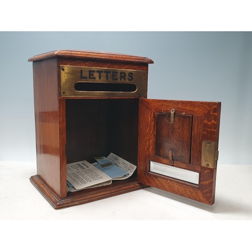 236 - An Edwardian oak Letter Box with brass covered slot engraved 'LETTERS' and bevelled glass collection... 