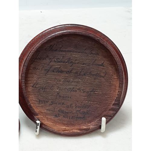 238 - An antique turned oak Snuff Box and Cover, the interior with inscription stating that it was made fr... 