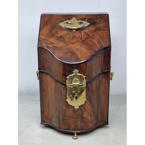 239 - A Georgian mahogany and brass mounted Stationery Box with hinged sloping front enclosing divisions a... 