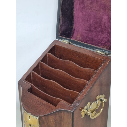 239 - A Georgian mahogany and brass mounted Stationery Box with hinged sloping front enclosing divisions a... 