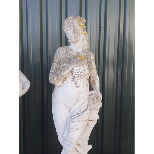 246 - A painted weathered composite stone Statue of a Classical Maiden Harvesting Grapes (possibly Demeter... 