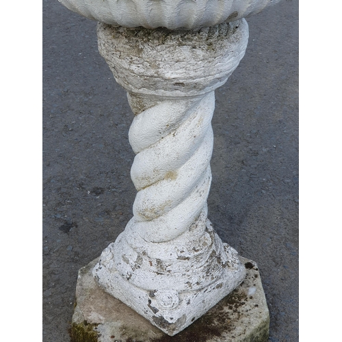 250 - A painted weathered composite stone Bird Bath, the bowl on spiral support and rosette decorations, a... 