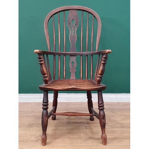 268 - A 19th Century ash Windsor Elbow Chair with pierced splat back, 3ft 4in H x 1ft 10in W