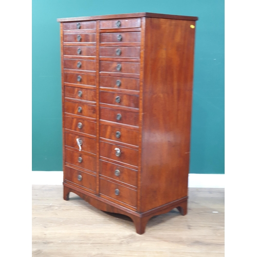 274 - A 19th Century mahogany bank of twenty two graduated Drawers, with ring handles and crossbanded deco... 