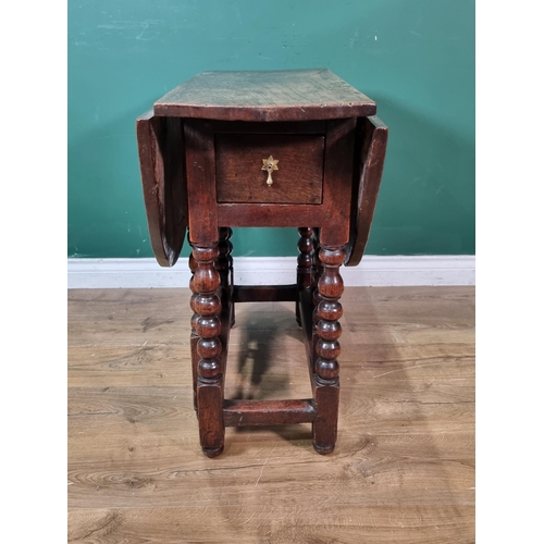 280 - A 17th Century oak Gateleg Table of small proportions fitted single end drawer raised on bobbin turn... 