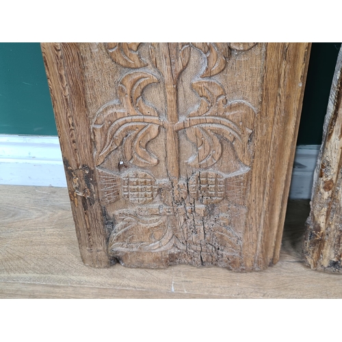 281 - A pair of 16th Century Cedar Panels, carved stylised flowers and thistle heads, 2ft 10in H x 11in W