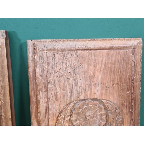 281 - A pair of 16th Century Cedar Panels, carved stylised flowers and thistle heads, 2ft 10in H x 11in W