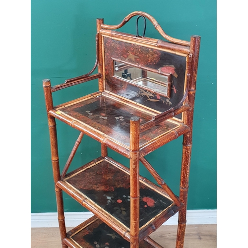 300 - A Victorian bamboo chinoiserie lacquered three tier Whatnot with raised shaped back with rectangular... 