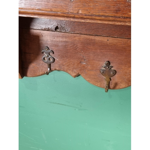 305 - A set of 18th Century Dutch oak Wall Shelves with moulded cornice above Cupid's bow shaped apron and... 