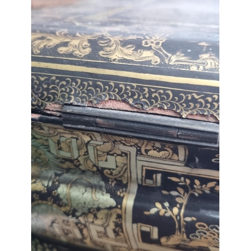 306 - A 19th Century chinoiserie ebonised and gilt Sewing/Work Table decorated figures and temples in a la... 