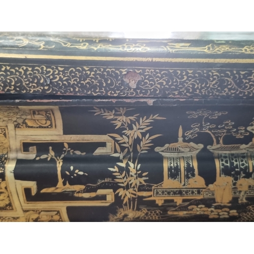 306 - A 19th Century chinoiserie ebonised and gilt Sewing/Work Table decorated figures and temples in a la... 