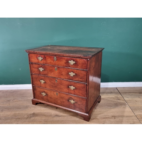 313 - An 18th Century cedar/fruitwood Chest of four long drawers 3ft 3in W on bracket supports.