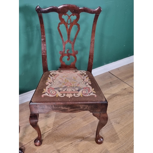 315 - A pair of 18th Century mahogany Side Chairs with pierced splat backs, drop in seats on cabriole supp... 