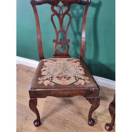 315 - A pair of 18th Century mahogany Side Chairs with pierced splat backs, drop in seats on cabriole supp... 