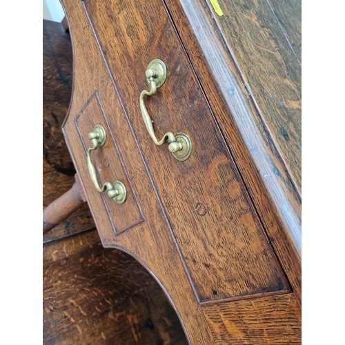 317 - A small antique oak Dresser Base with moulded top above three drawers, two small drawers and a dummy... 