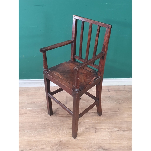 320 - An 18th Century oak child's High Chair with slat back, sabre rear legs and square front supports 3ft... 