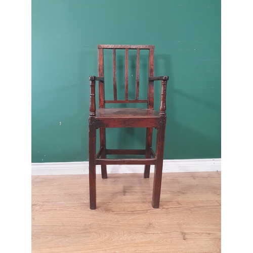 320 - An 18th Century oak child's High Chair with slat back, sabre rear legs and square front supports 3ft... 